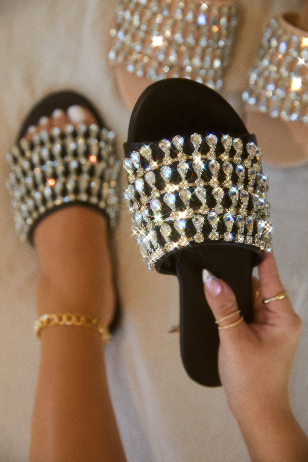 Black embellished slip on sandals