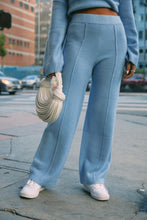 Load image into Gallery viewer, Women Standing with Blue Pants
