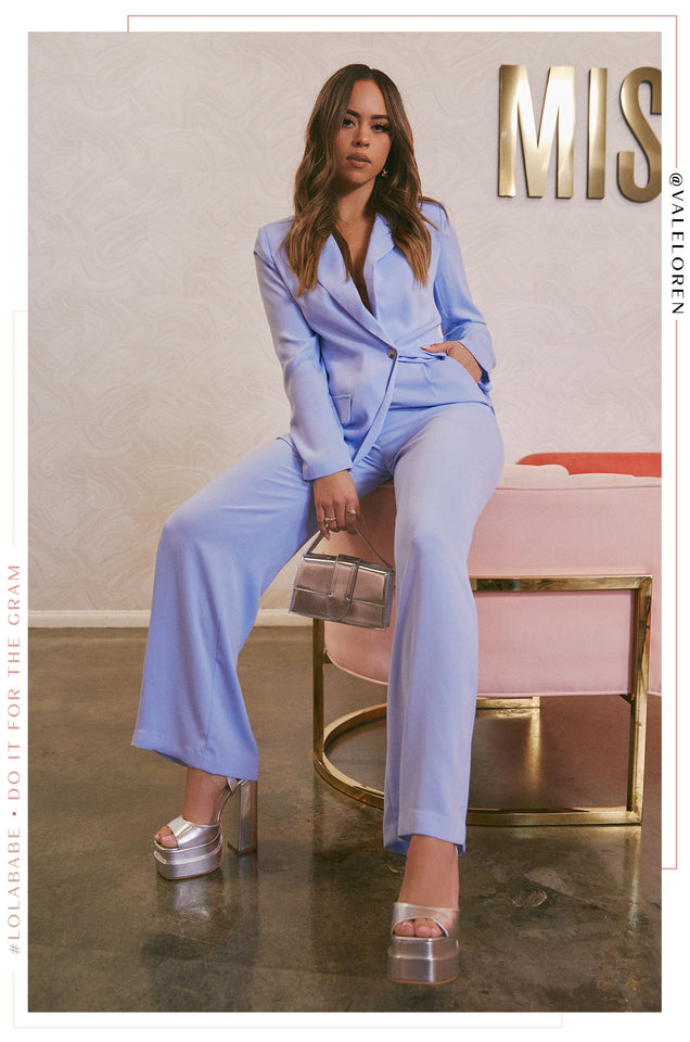 Load image into Gallery viewer, Women Wearing Blue Pant Suit With Silver shoes And bag 
