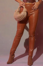 Load image into Gallery viewer, Women Wearing Tan PU Pants
