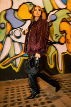 Load image into Gallery viewer, Women Walking with Black Handbag
