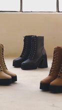 Load and play video in Gallery viewer, Video of Model Trying On Boots Available In Nude, tan, And Black 
