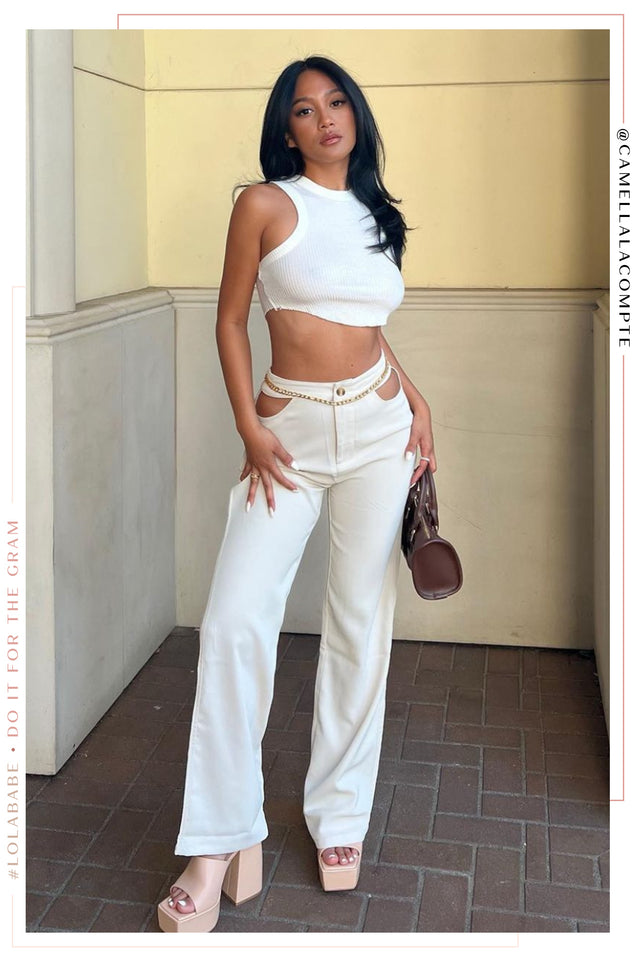 Load image into Gallery viewer, Women Standing with White Crop Top
