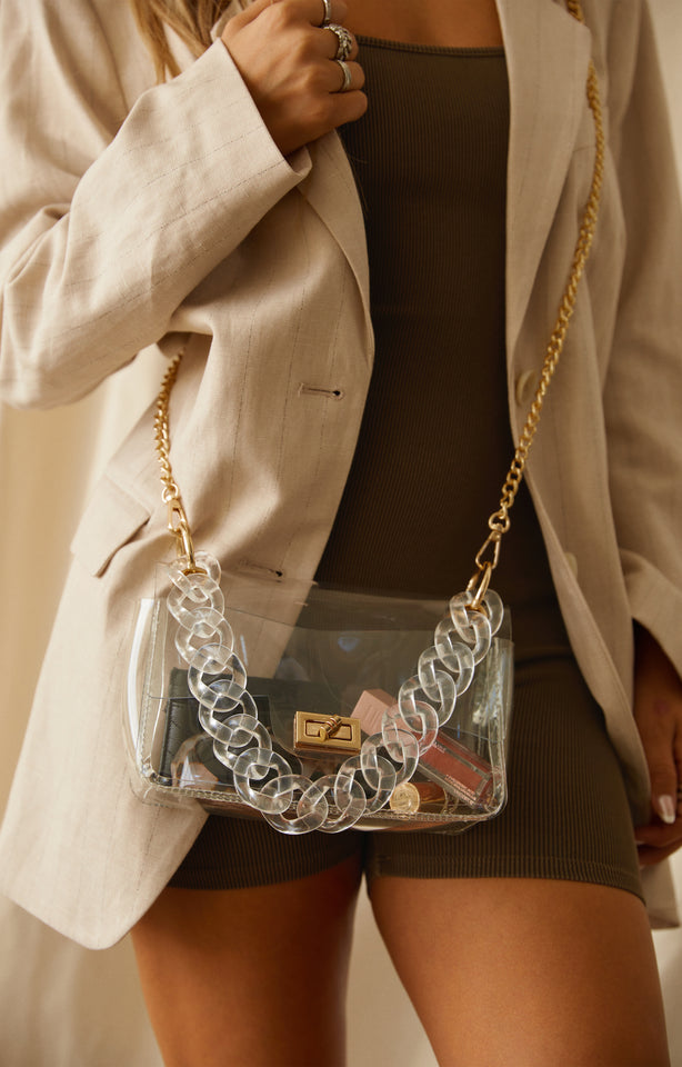 Load image into Gallery viewer, Model Standing Wearing Clear Shoulder Bag
