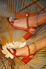 Load image into Gallery viewer, Women Wearing Tan Heels

