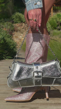 Load and play video in Gallery viewer, Glitter pink knee high boots with embellished fringe detailing paired with bag on model

