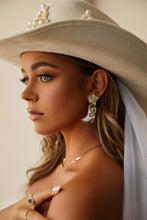 Load image into Gallery viewer, Model Wearing White Beaded Cowgirl Boot with Beaded Cowgirl Hat
