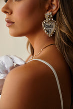 Load image into Gallery viewer, Women Standing with Heart Dangle Earring
