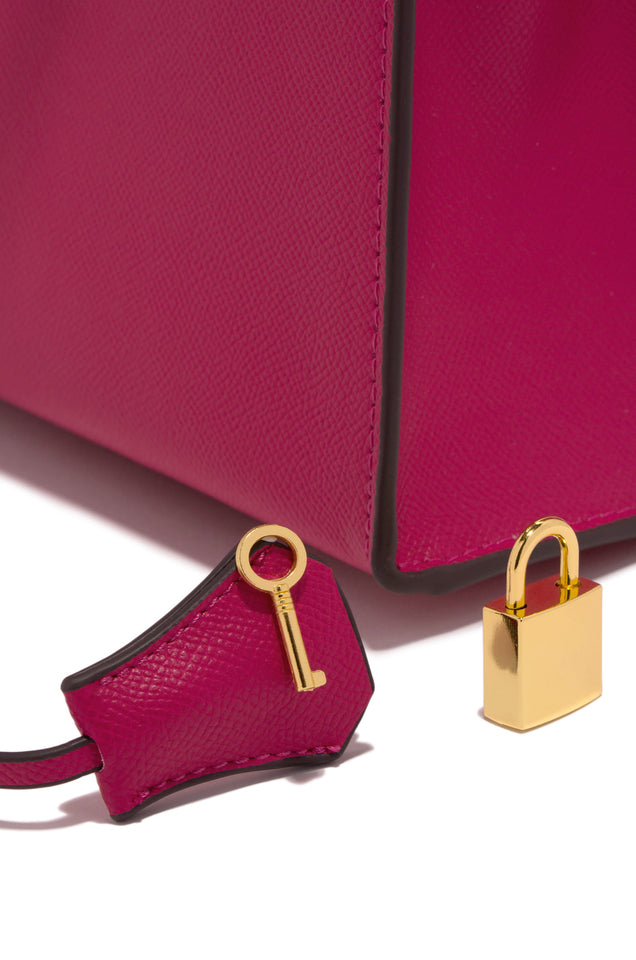 Load image into Gallery viewer, Pink Handbag with Gold-Tone Lock and Key Accessory
