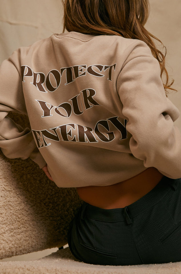 Load image into Gallery viewer, Women Wearing Protect Your Energy Sweater
