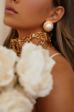 Load image into Gallery viewer, Women Wearing Gold-Tone Earring with Pearl Detailing
