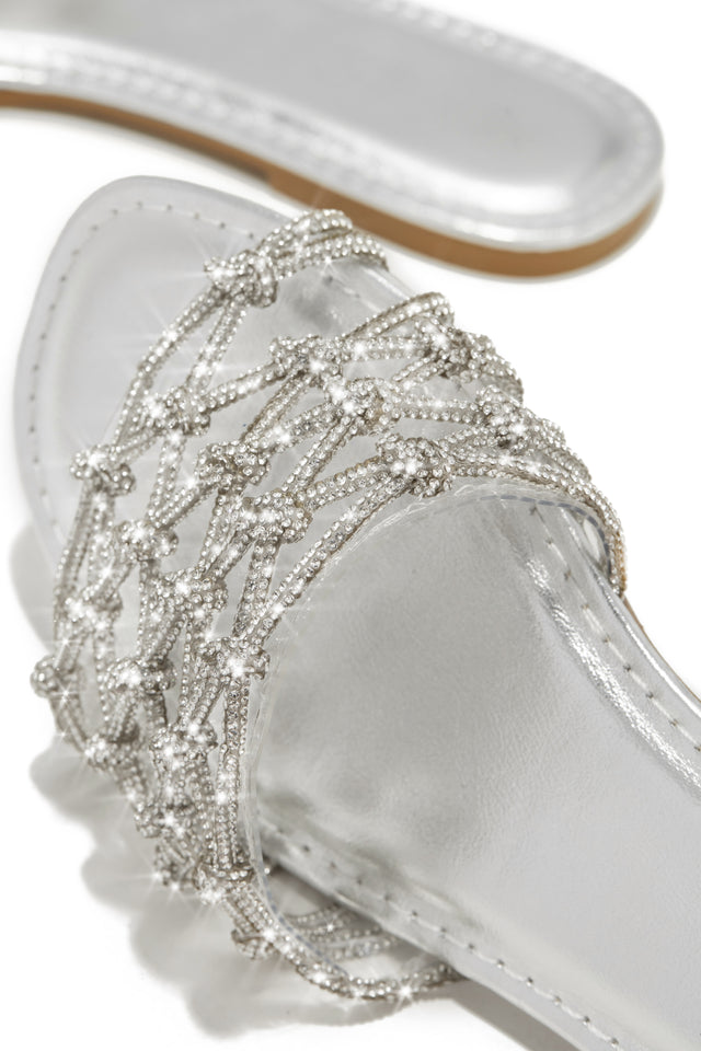 Load image into Gallery viewer, close up detail of the beautiful rhinestone design of this metallic silver sandal.
