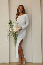 Load image into Gallery viewer, Model Holding Floral Bouquet Wearing White Maxi Dress
